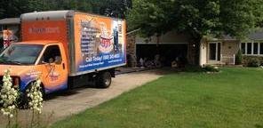 Water Damage and Mold Removal Truck At Job Site