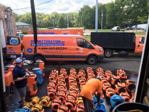 Technicians Preparing For A Water Cleanup Job 