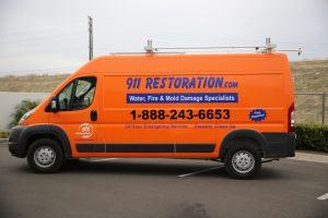 Water Damage Restoration Truck Going To Job Site