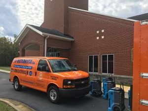 Fire Cleanup Crew At A Residential Job Site